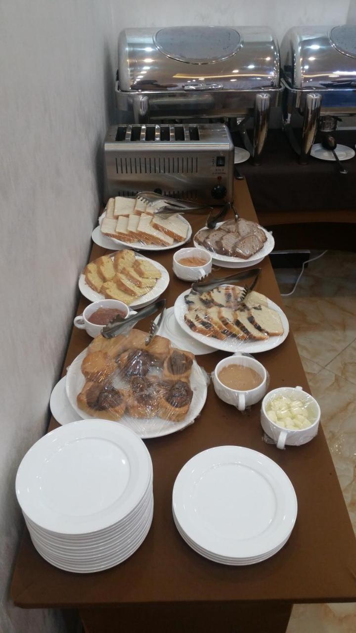 Marcen Addis Hotel Bagian luar foto